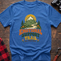 Heather royal cotton t-shirt with a smiling mountain and trail graphic and Emotional Support Trail text on rustic wood