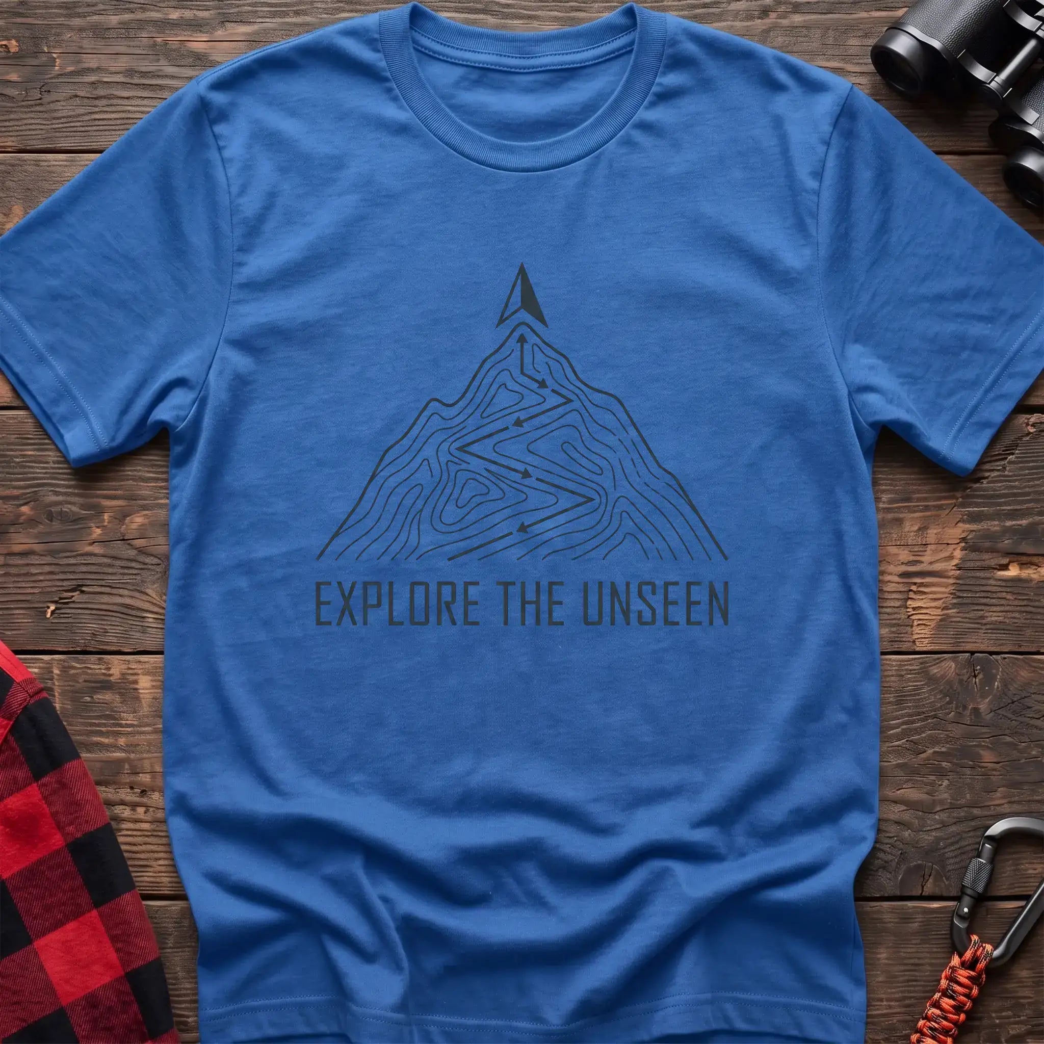 Heather royal t-shirt with topographic mountain trail graphic and the text Explore the Unseen