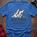 Heather royal cotton t-shirt with a mountain goat on a peak graphic and Goat Trails Glacier text on rustic wood