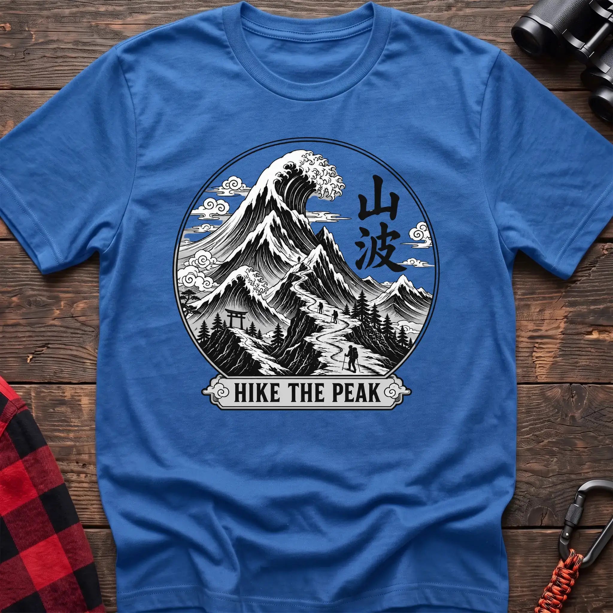 Heather royal t-shirt with circular Japanese-style mountain and wave graphic featuring hikers and the text Hike the Peak
