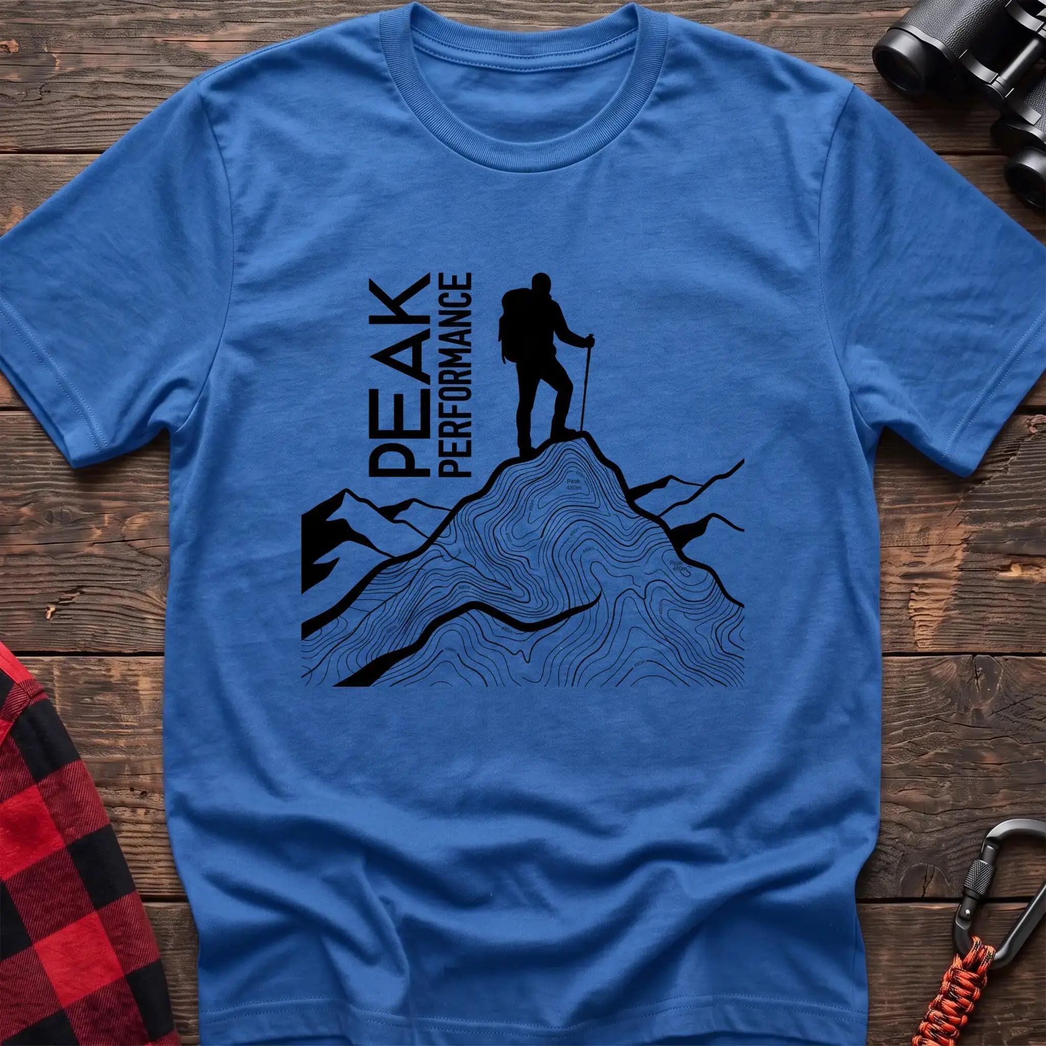Heather royal t-shirt with hiker silhouette on a topographic mountain peak and the text Peak Performance