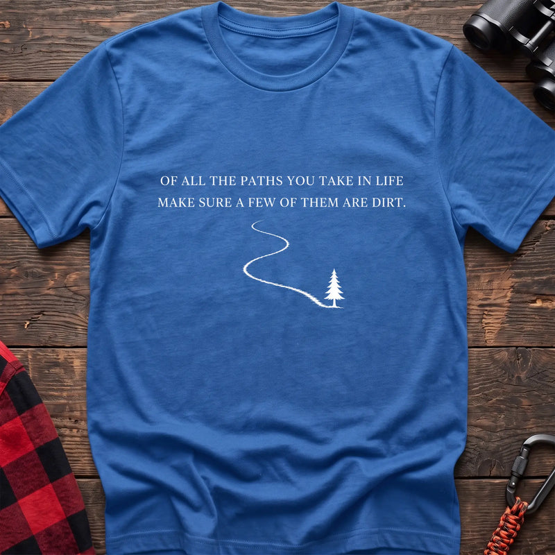 Heather royal cotton hiking t-shirt with white quote "Of all the paths you take in life make sure a few of them are dirt" and winding dirt path to pine tree graphic