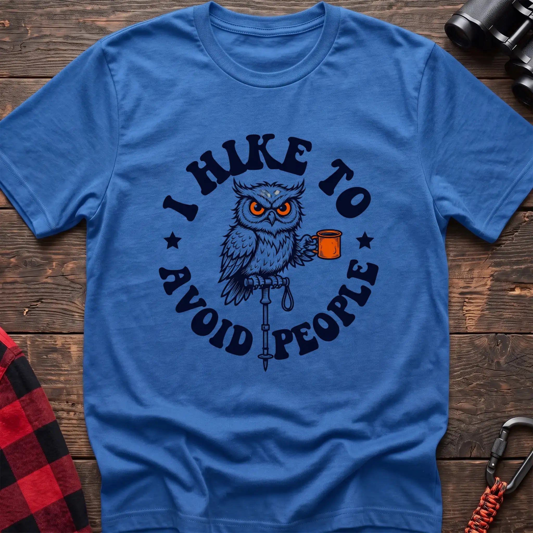 Heather royal t-shirt with owl holding a camping mug on a hiking pole and the text I Hike to Avoid People