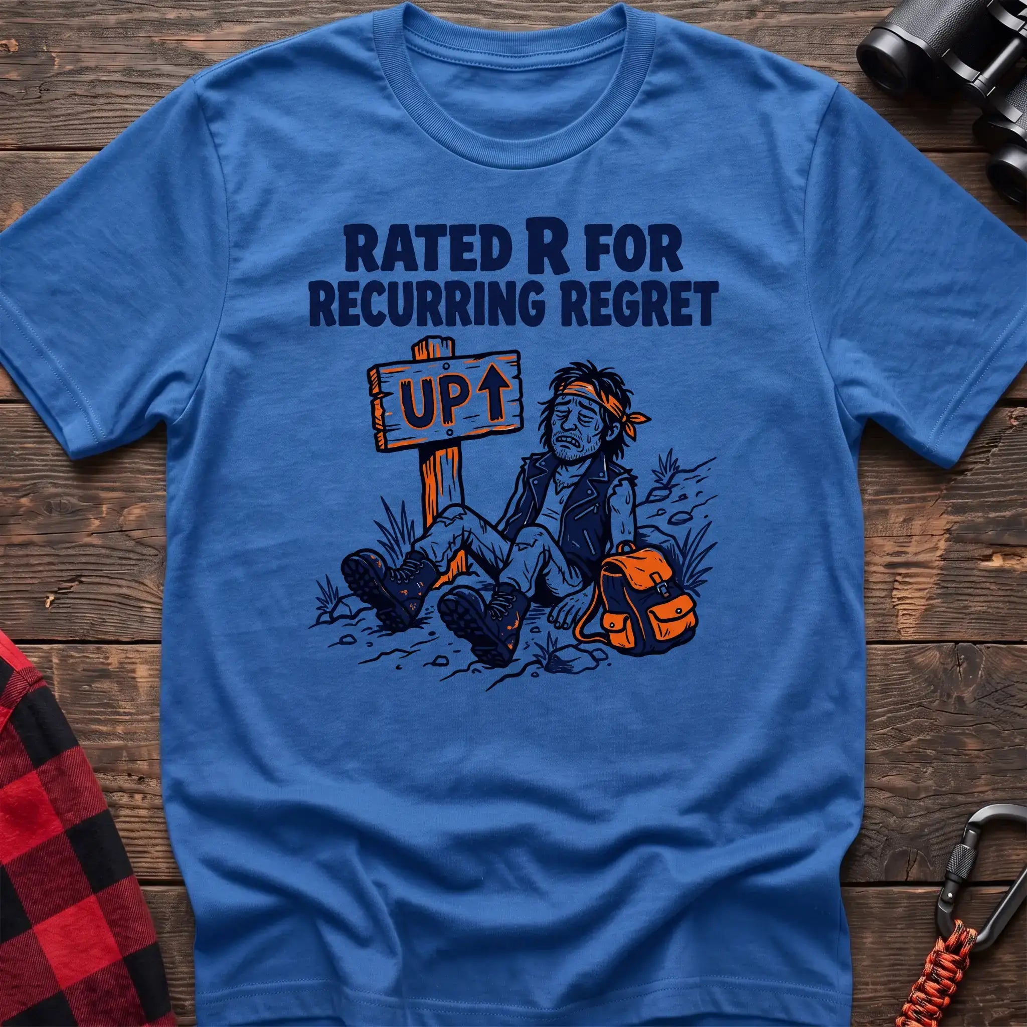 Heather royal t-shirt with illustration of an exhausted hiker sitting by an UP trail sign and the text Rated R for Recurring Regret