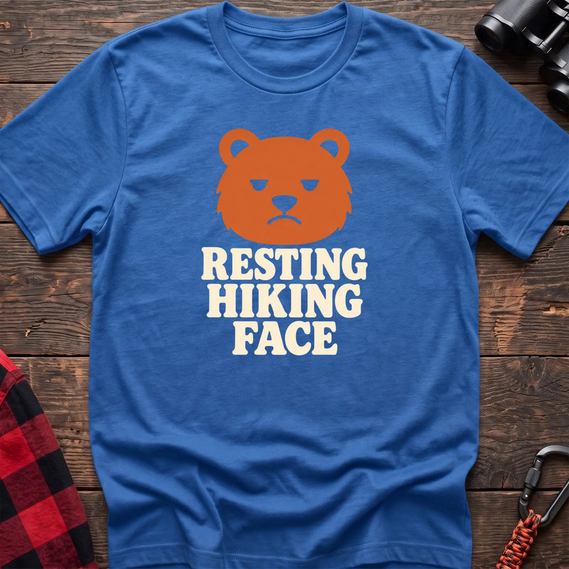 Heather royal cotton t-shirt with a grumpy bear graphic and Resting Hiking Face text on rustic wood