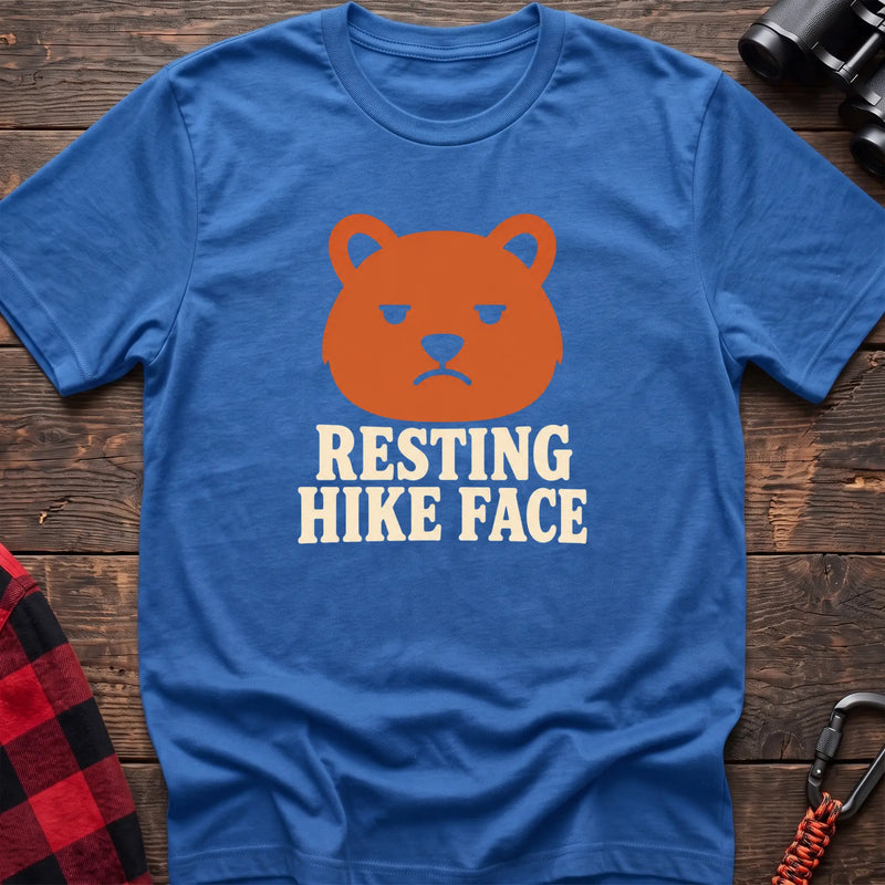 Heather royal cotton t-shirt with a grumpy bear graphic and Resting Hike Face text on rustic wood