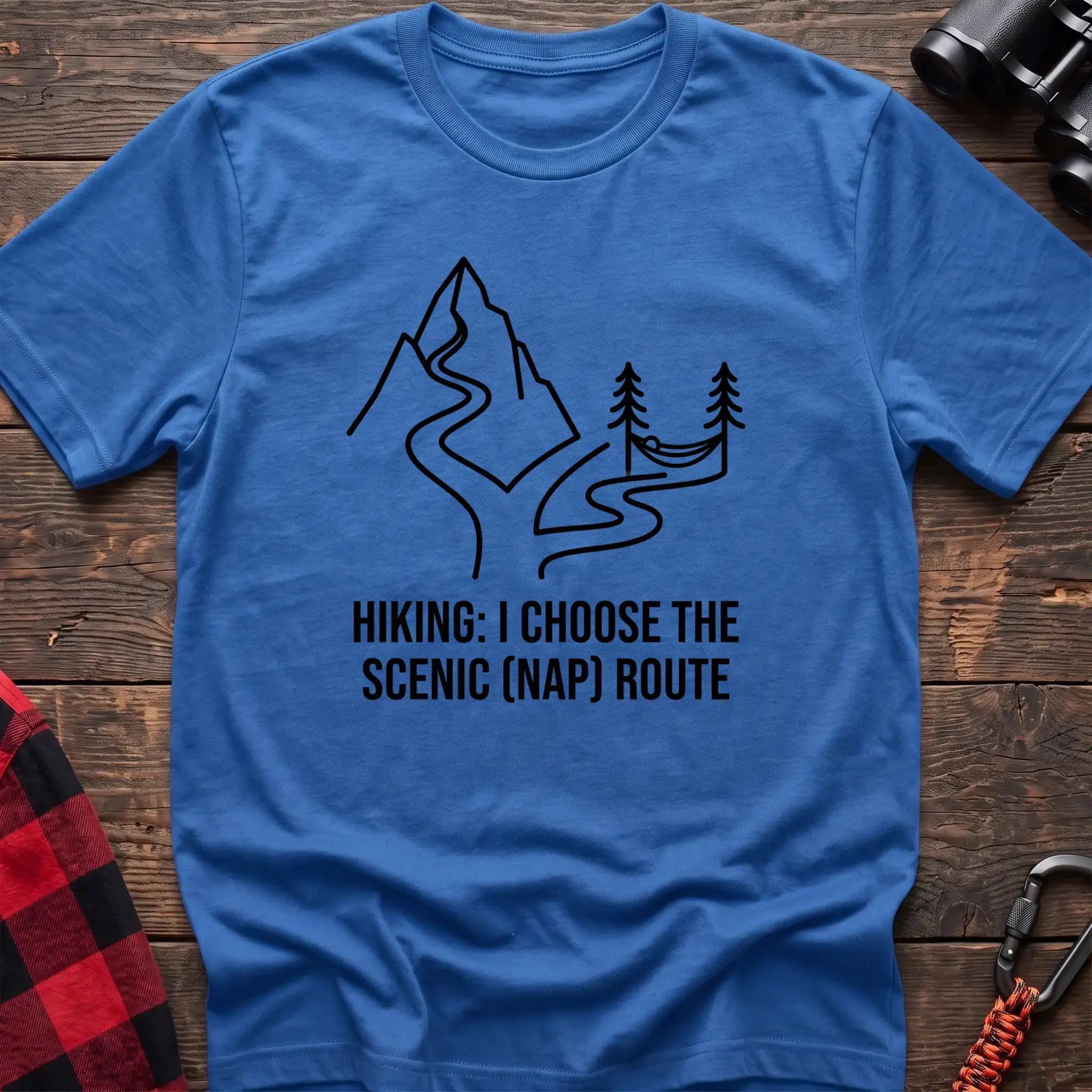 Heather royal t-shirt with minimalist mountain trail and hammock graphic reading Hiking I Choose the Scenic Nap Route
