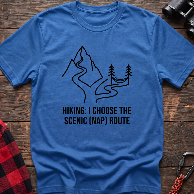 Heather royal t-shirt with minimalist mountain trail and hammock graphic reading Hiking I Choose the Scenic Nap Route