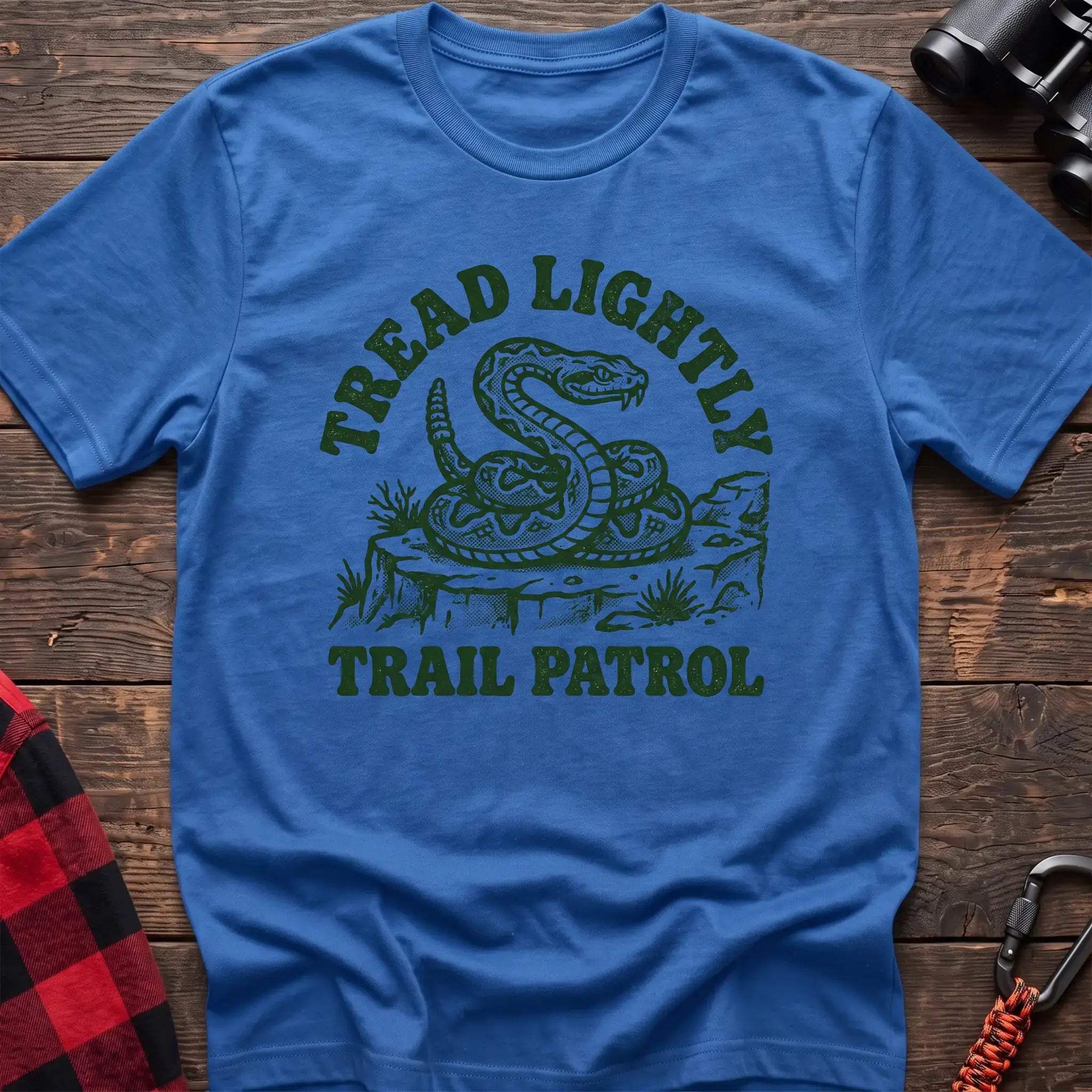 Heather royal t-shirt with dark green rattlesnake illustration and the text Tread Lightly Trail Patrol