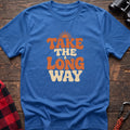 Heather royal cotton t-shirt with retro wavy text and Take the Long Way lettering on rustic wood