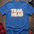 Black cotton t-shirt with retro stacked Trail Head text on rustic wood