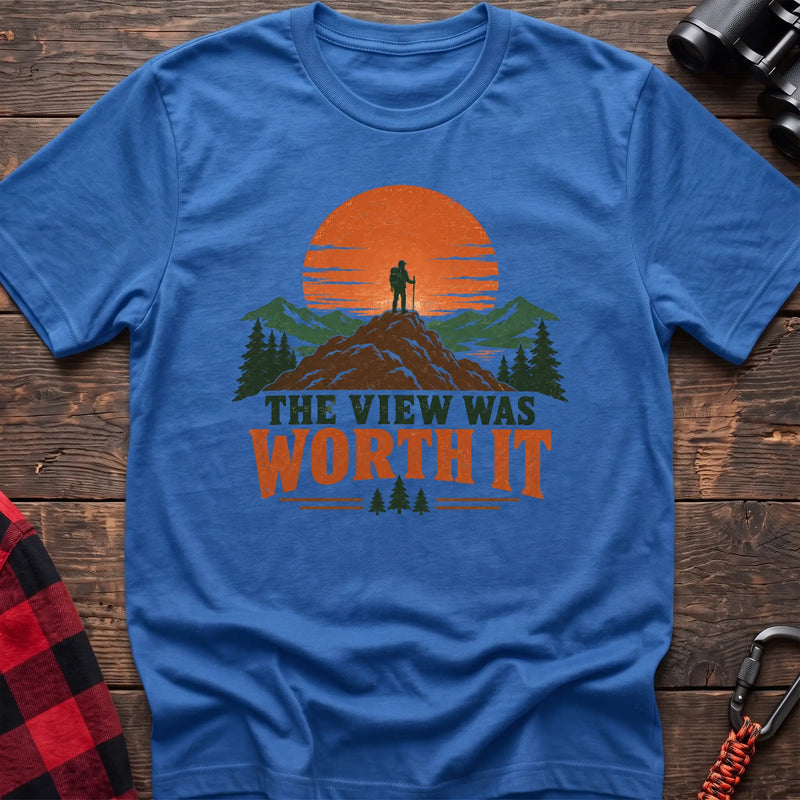 Heather royal cotton t-shirt with a hiker on a mountain sunset graphic and The View Was Worth It text on rustic wood