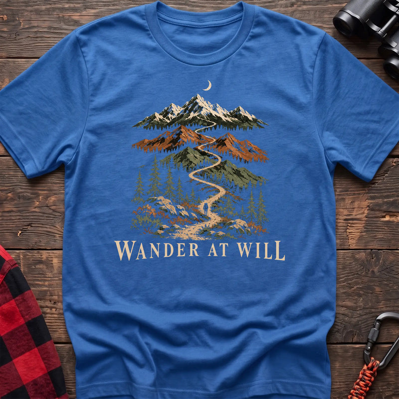 Heather royal cotton t-shirt with a mountain trail graphic and Wander at Will text on rustic wood