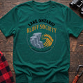 Kelly green hiking t-shirt with Lake Ontario Bluff Society badge showing a cliff, wave, and Members Keep to the Marked Edge