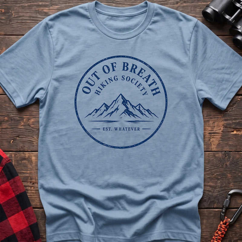 Light blue hiking t-shirt with Out of Breath Hiking Society mountain badge and Est Whatever text