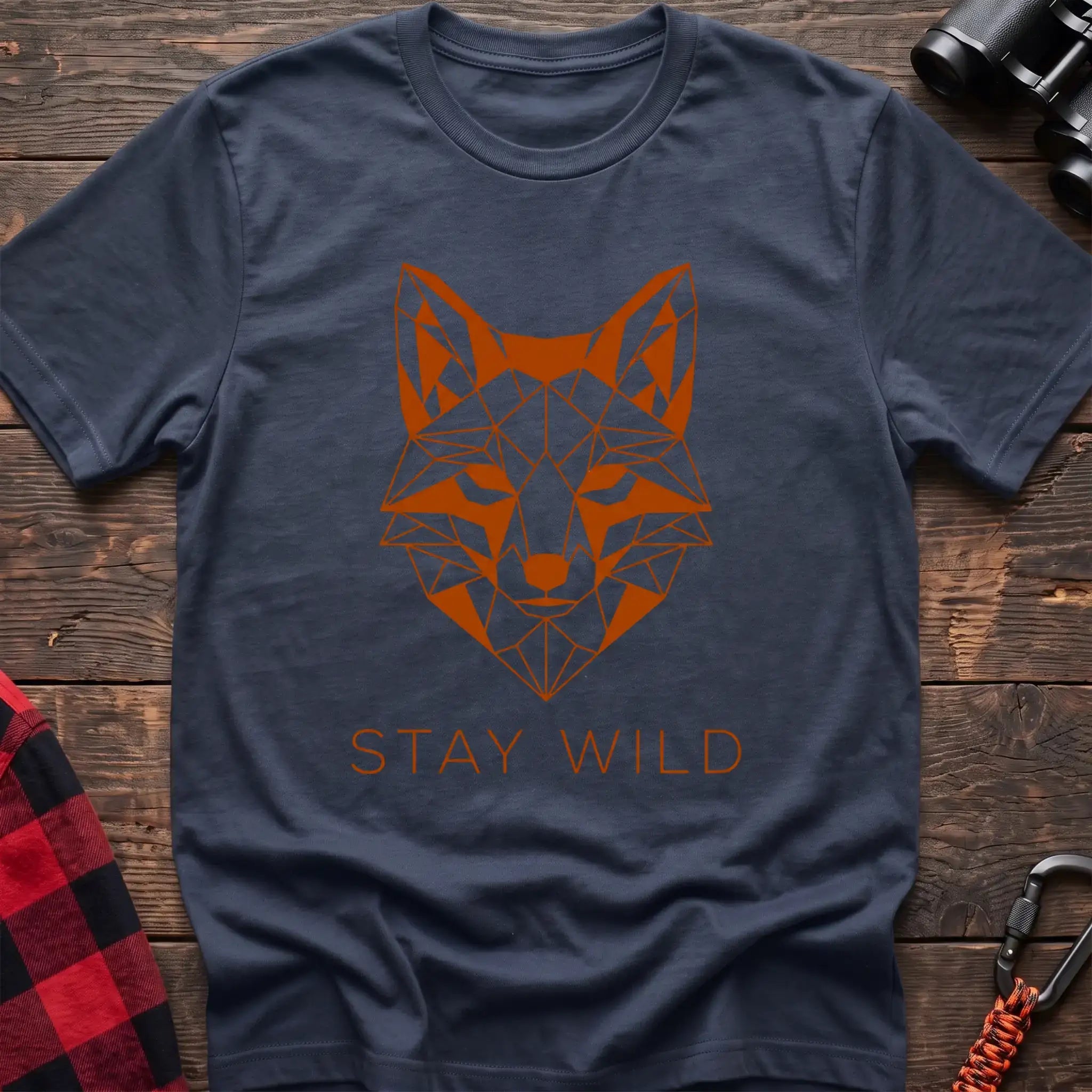 Navy t-shirt with geometric orange fox head graphic and the text Stay Wild