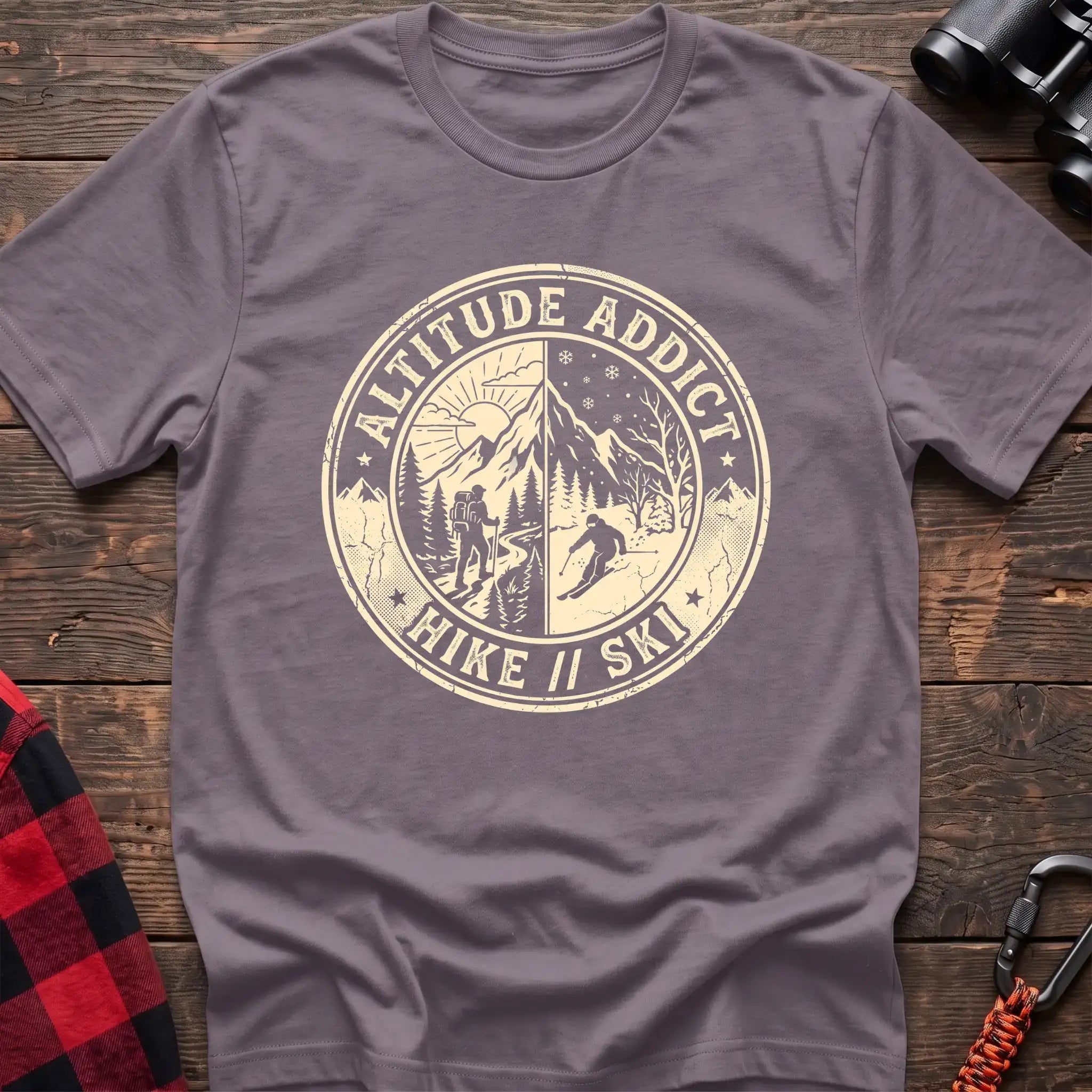 Paragon t-shirt with circular badge graphic of a hiker and skier on split mountain scenes, reading Altitude Addict Hike Ski