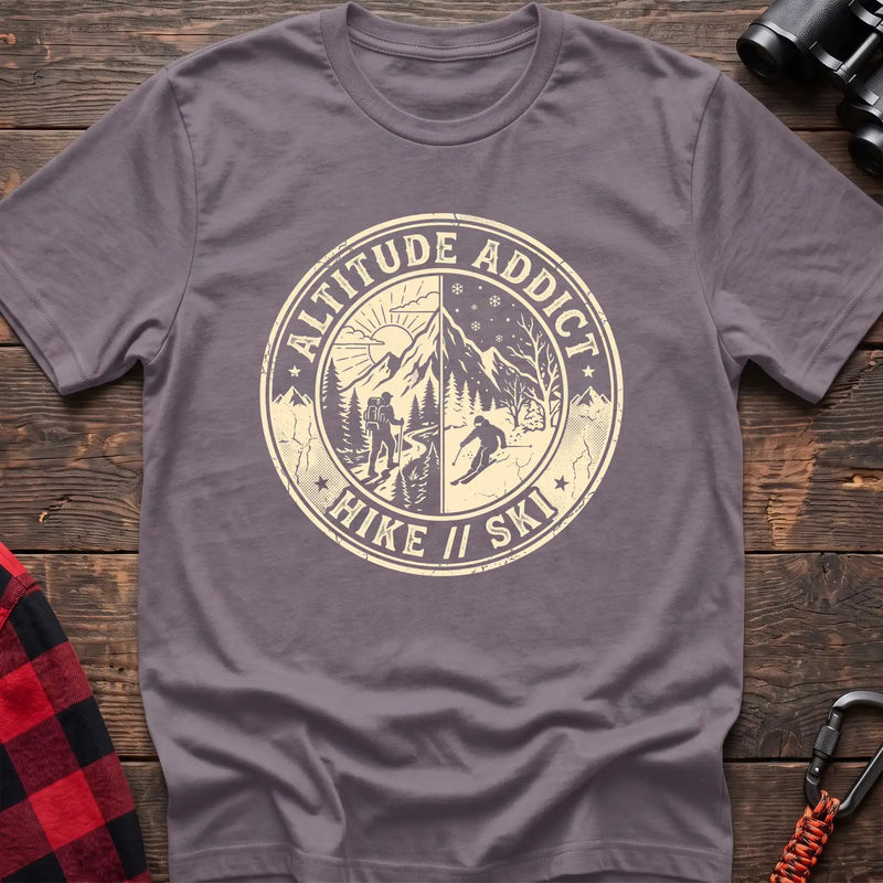 Paragon t-shirt with circular badge graphic of a hiker and skier on split mountain scenes, reading Altitude Addict Hike Ski