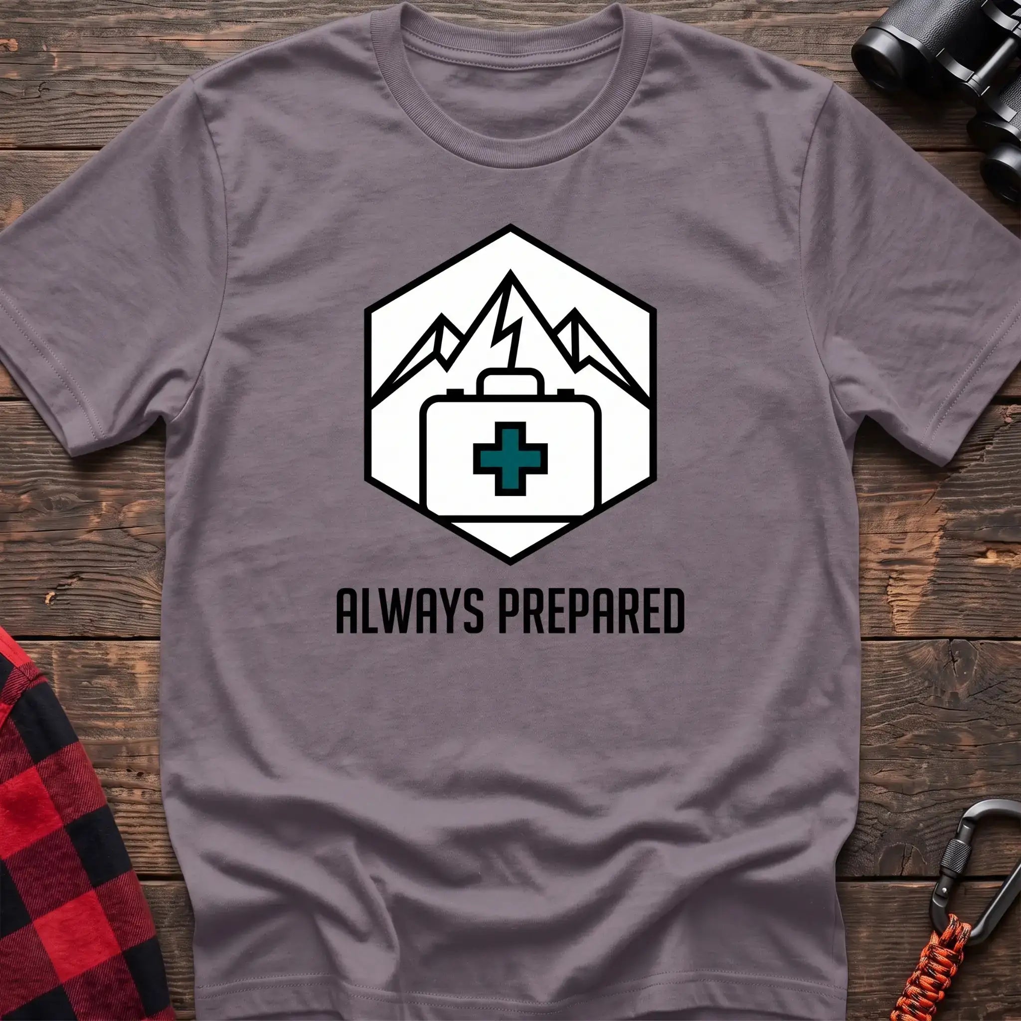 Paragon t-shirt with hexagonal badge graphic of mountains and a first aid kit, reading Always Prepared