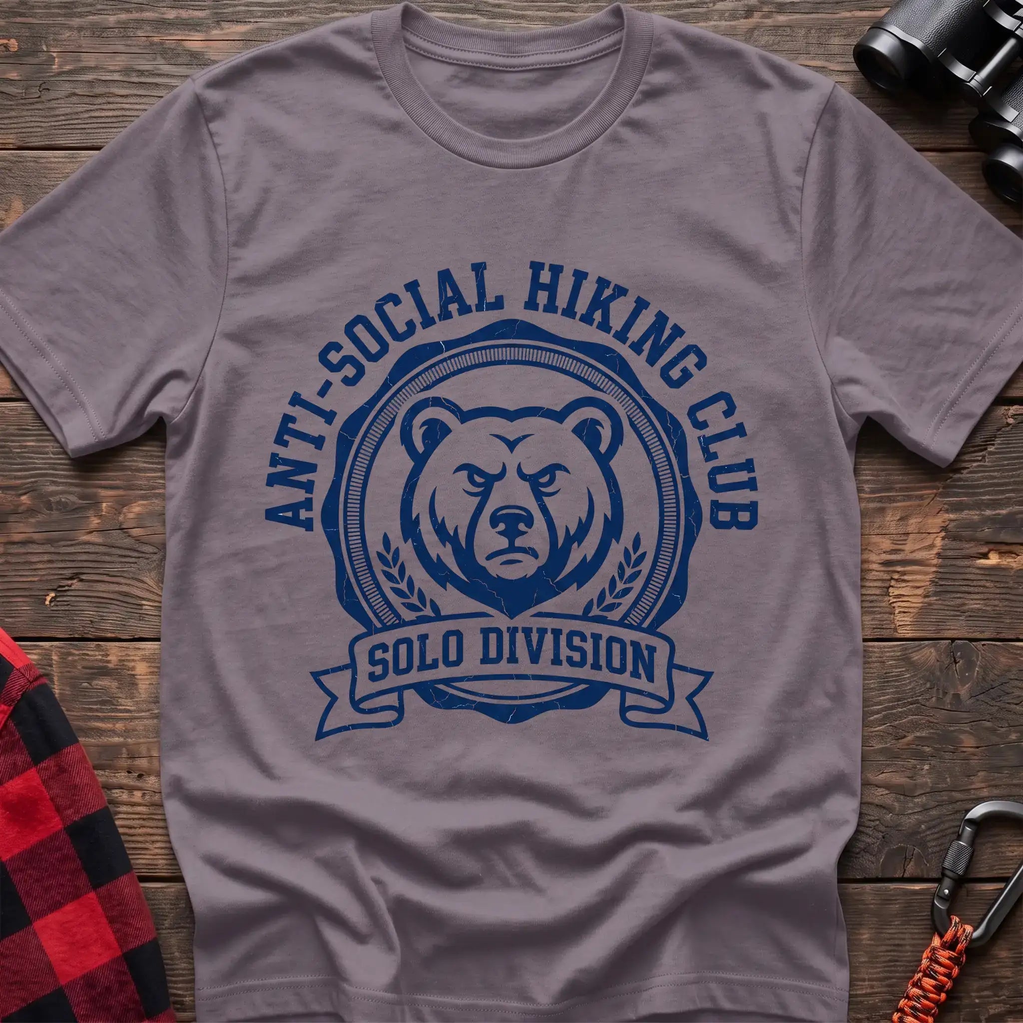 Paragon t-shirt with circular badge of a serious bear face reading Anti-Social Hiking Club Solo Division