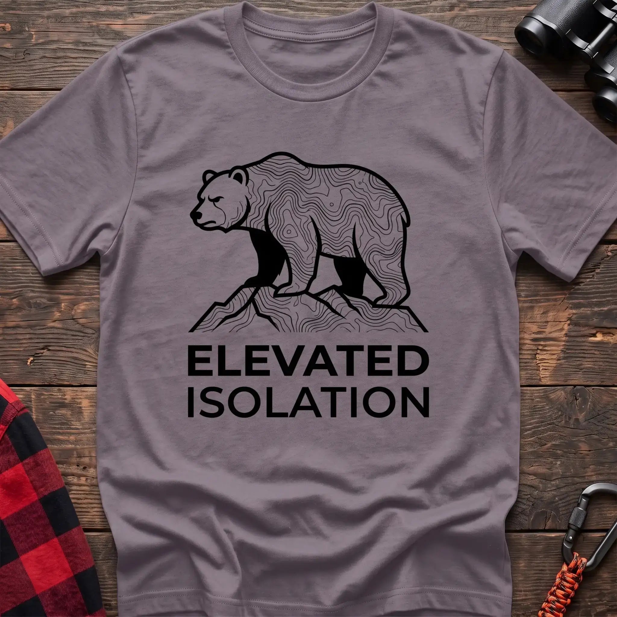 Paragon t-shirt with topographic bear standing on a mountain peak and the text Elevated Isolation