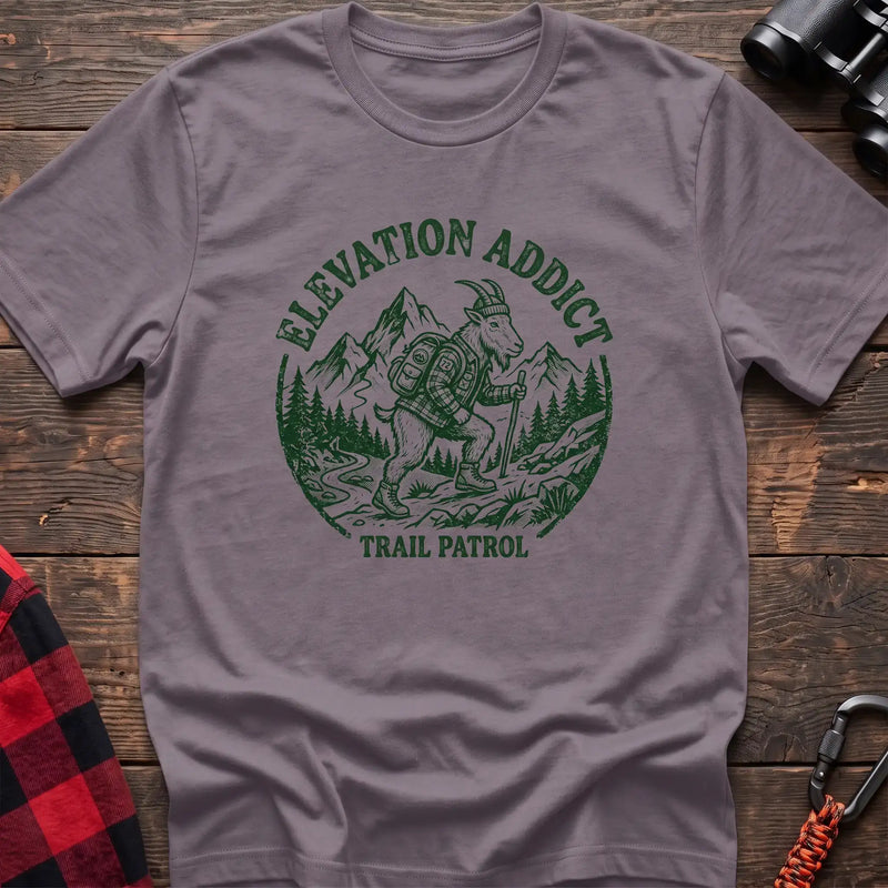 Paragon t-shirt with circular graphic of a hiking mountain goat and the text Elevation Addict Trail Patrol