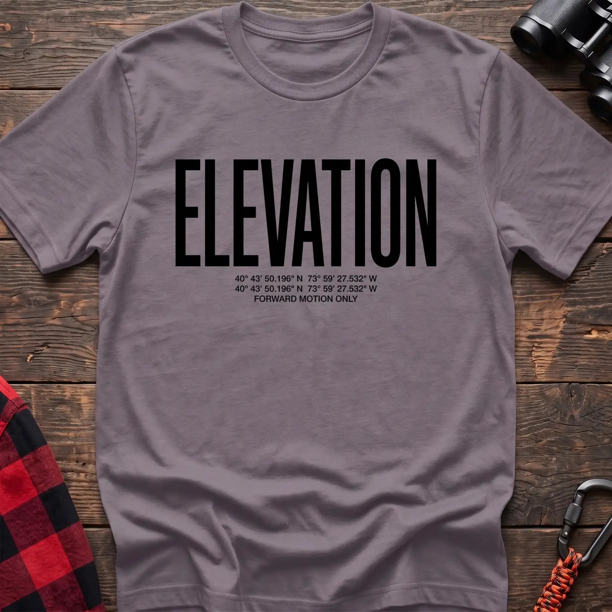 Paragon t-shirt with large black text reading Elevation and GPS coordinates with Forward Motion Only