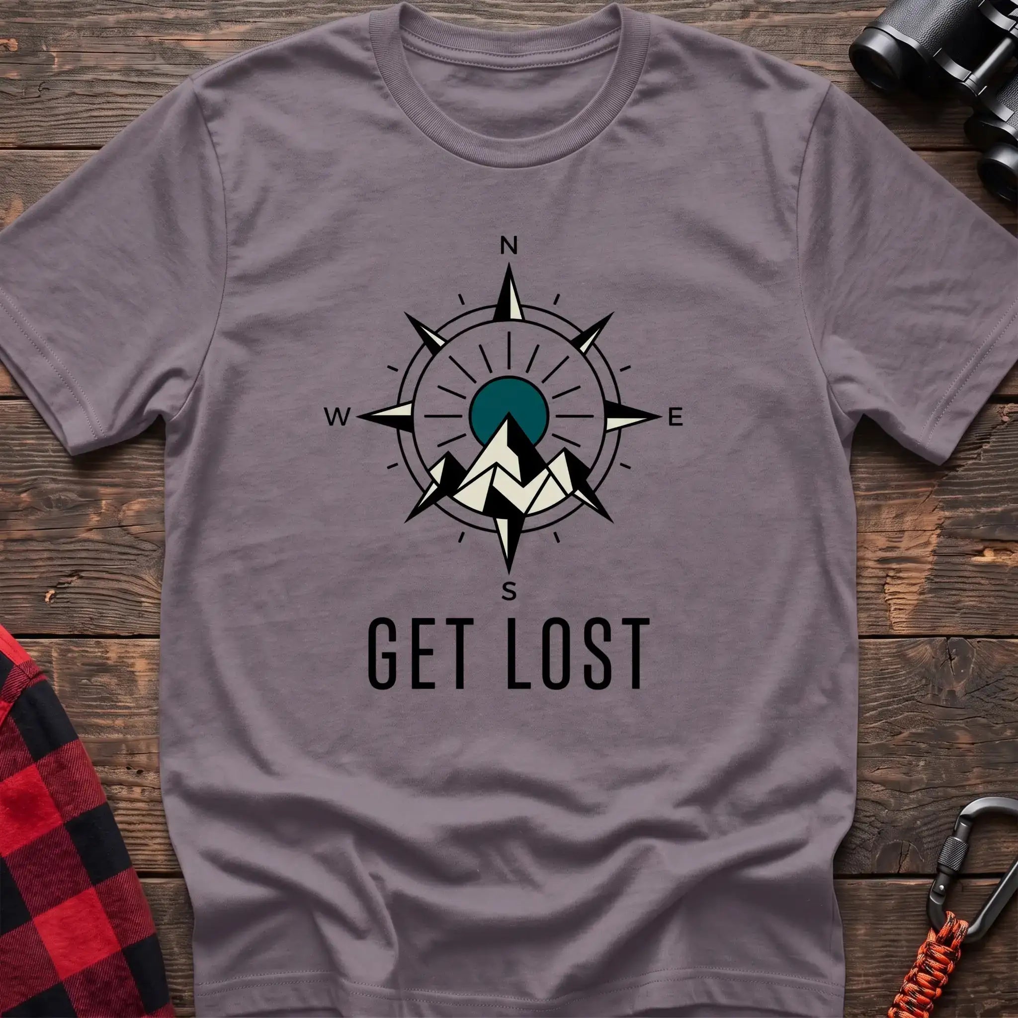 Paragon t-shirt with compass rose graphic featuring mountains in the center and the text Get Lost