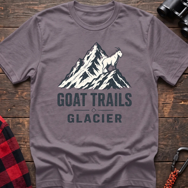 Paragon cotton t-shirt with a mountain goat on a peak graphic and Goat Trails Glacier text on rustic wood