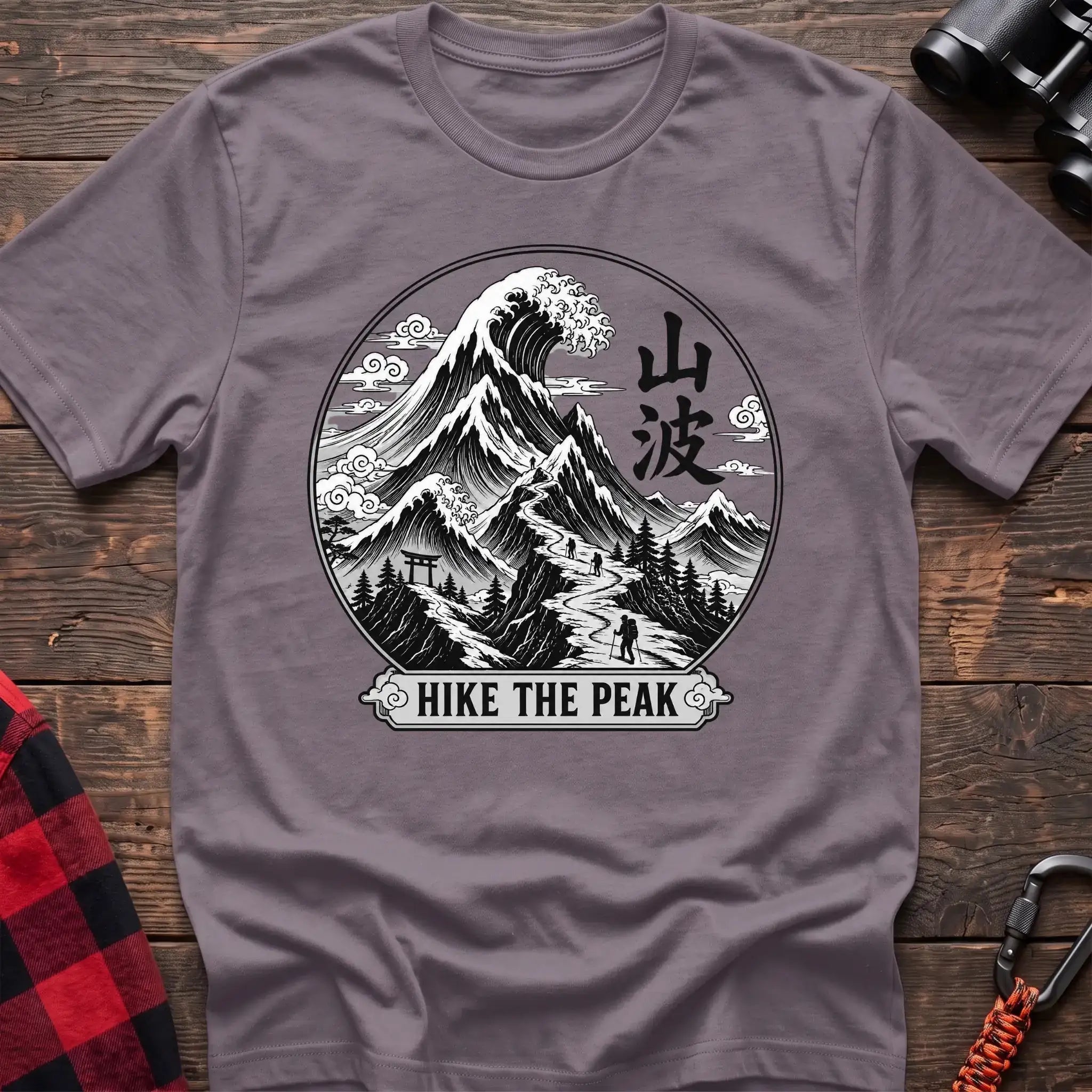 Paragon t-shirt with circular Japanese-style mountain and wave graphic featuring hikers and the text Hike the Peak