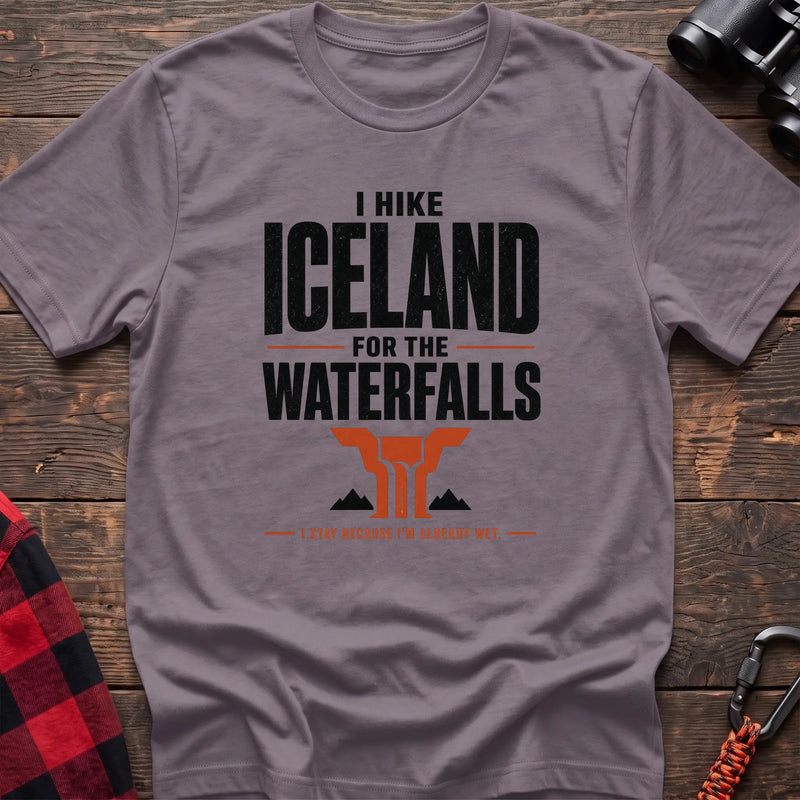 Paragon cotton t-shirt with a waterfall graphic and I Hike Iceland for the Waterfalls text on rustic wood