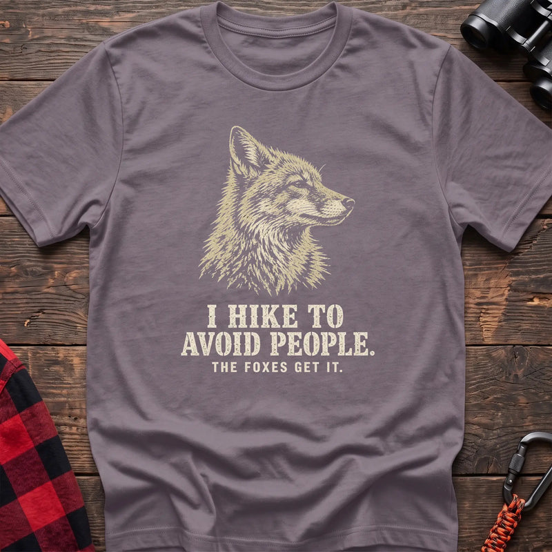 Paragon cotton t-shirt with a fox graphic and I Hike to Avoid People The Foxes Get It text on rustic wood
