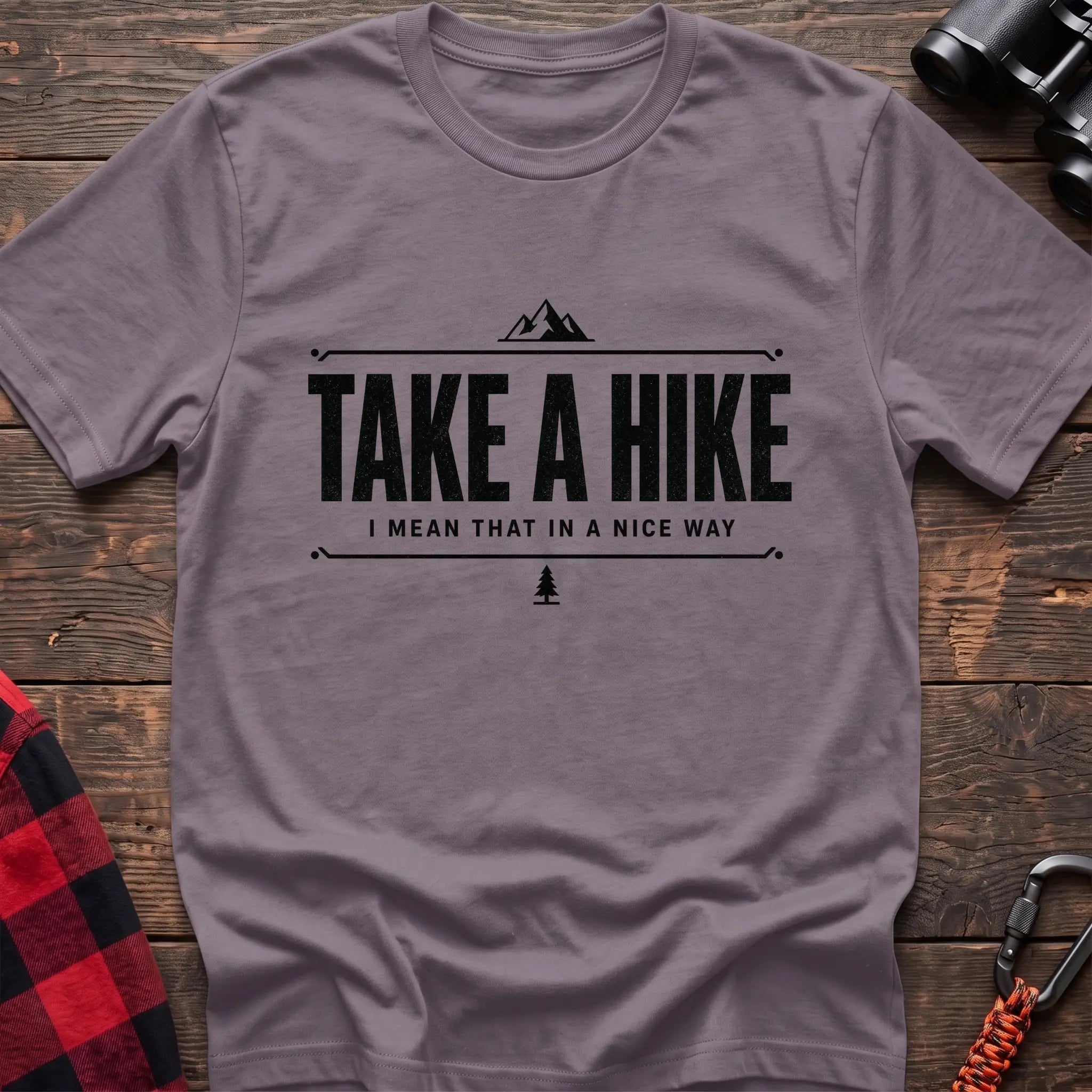 Paragon cotton hiking t-shirt with "Take a Hike I Mean That in a Nice Way" quote, mountain icon, and pine tree graphic