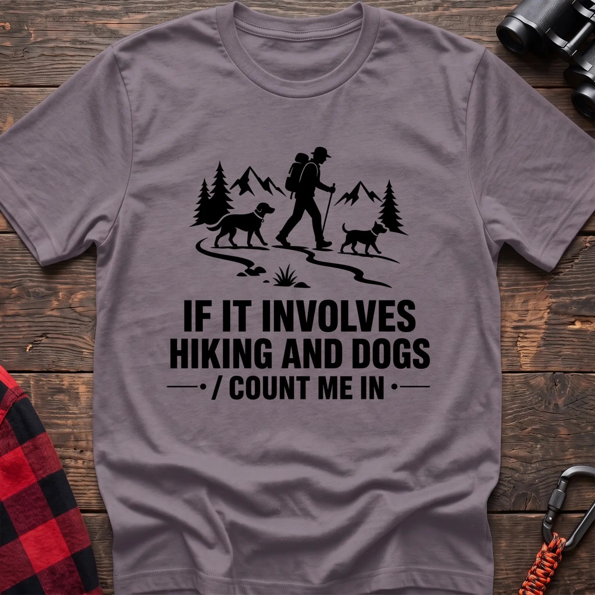 Paragon cotton hiking t-shirt with hiker and two dogs silhouette on a mountain trail and "If it involves hiking and dogs count me in" quote