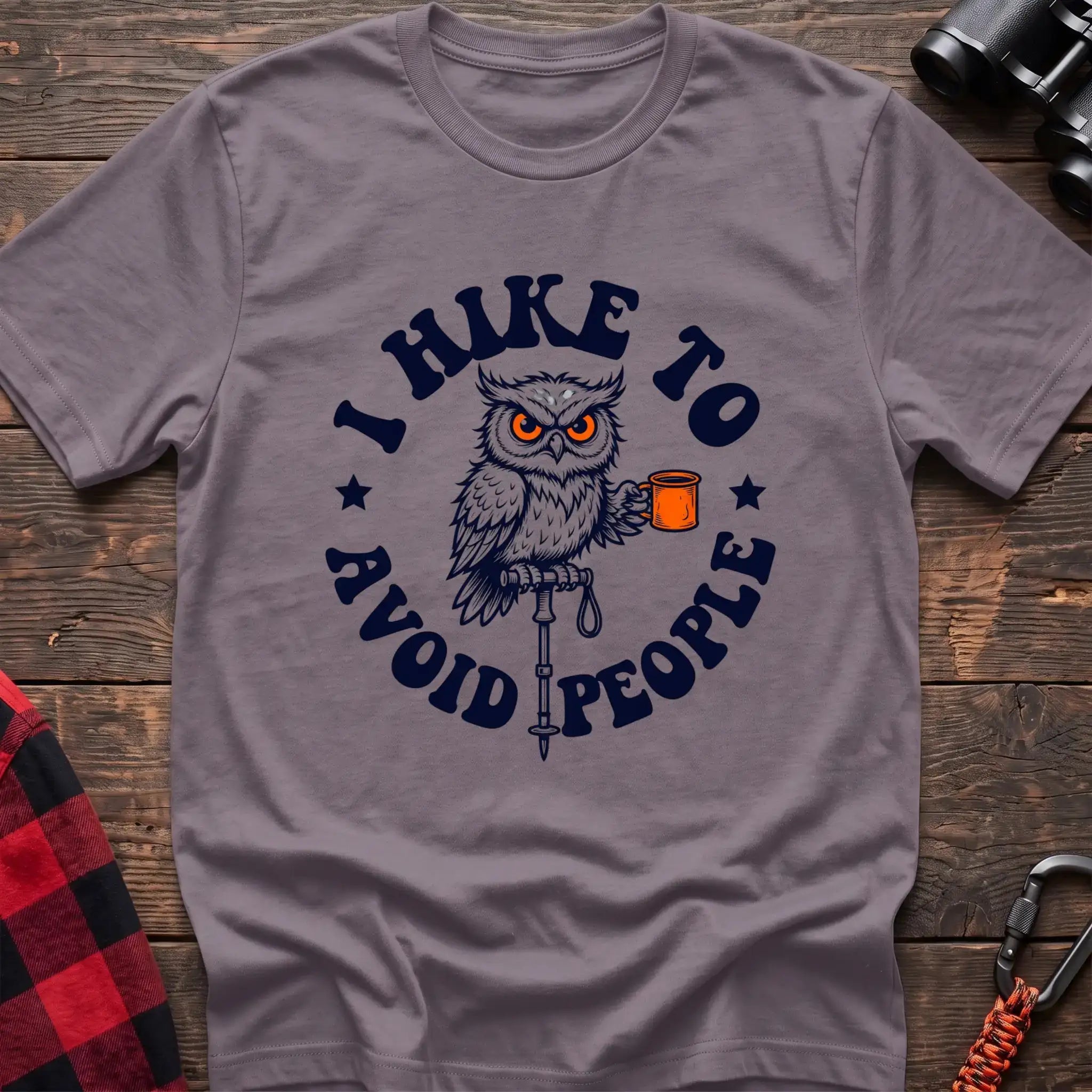 Paragon t-shirt with owl holding a camping mug on a hiking pole and the text I Hike to Avoid People