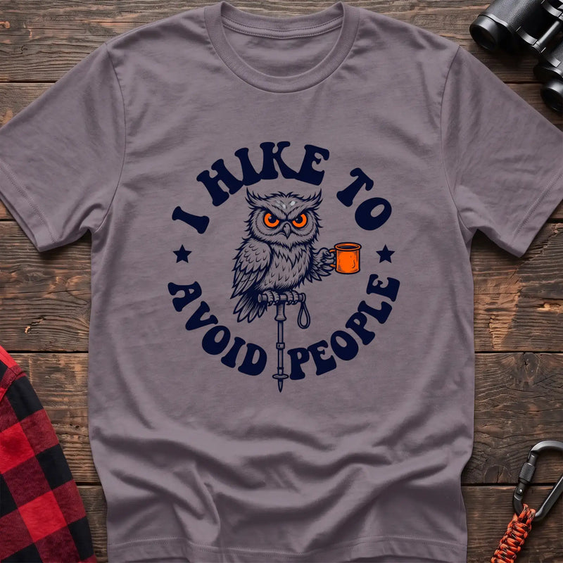 Paragon t-shirt with owl holding a camping mug on a hiking pole and the text I Hike to Avoid People