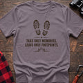 Paragon hiking graphic T-shirt with boot prints and “Take only memories, leave only footprints” trail design