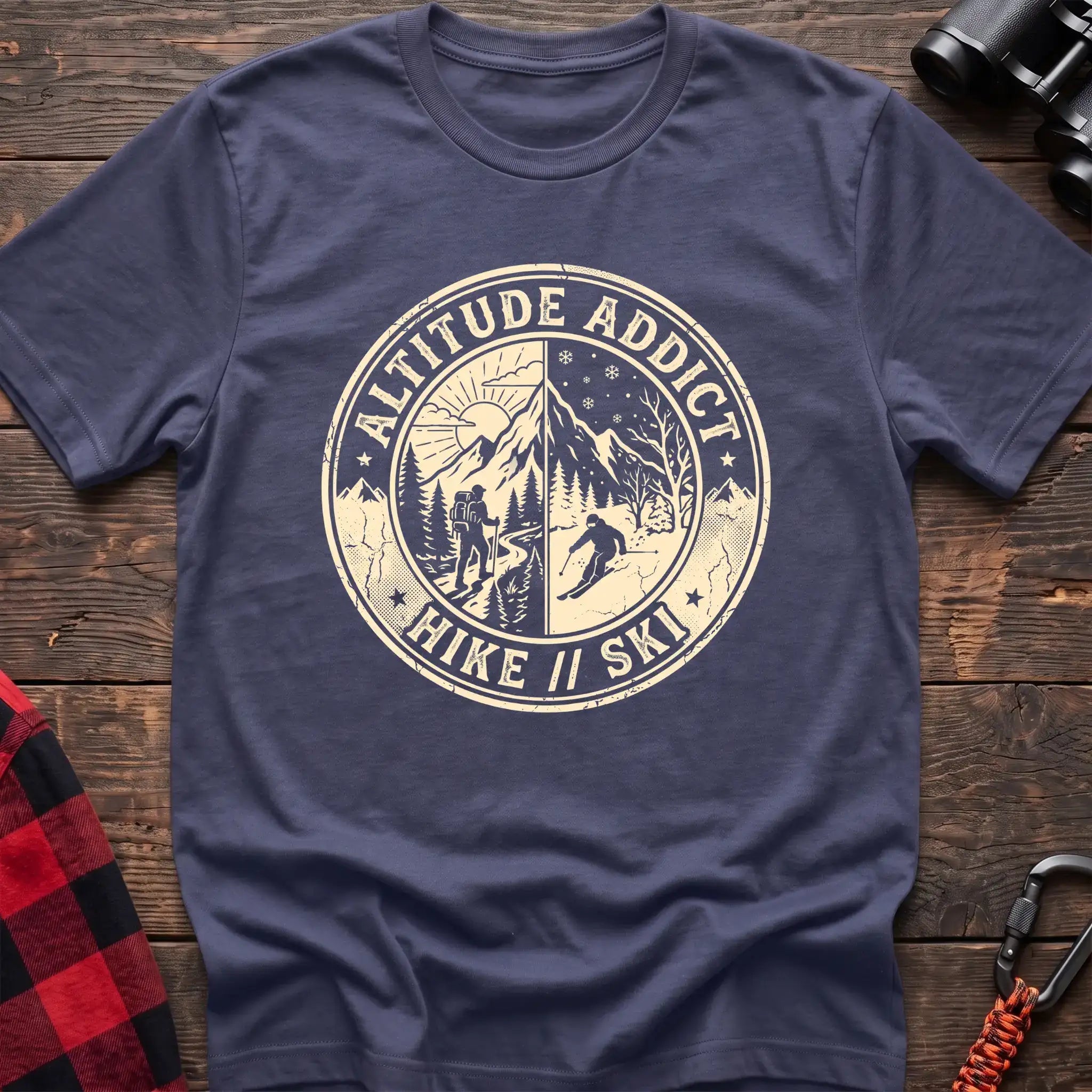 Purple t-shirt with circular badge graphic of a hiker and skier on split mountain scenes, reading Altitude Addict Hike Ski