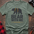 Sage cotton hiking t-shirt with black bear wearing a backpack and the text “Bear With Me I’m Hiking”