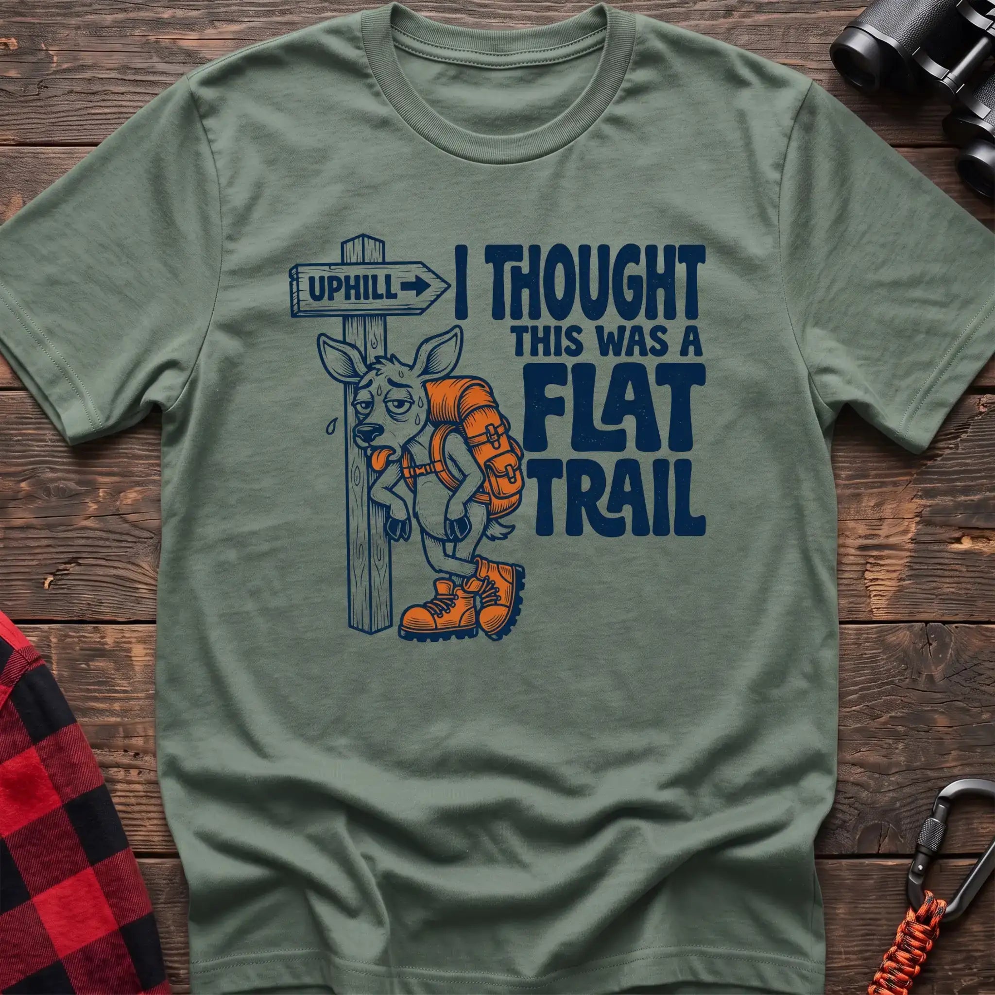 Sage t-shirt with exhausted deer leaning on an Uphill trail sign and the text I Thought This Was a Flat Trail
