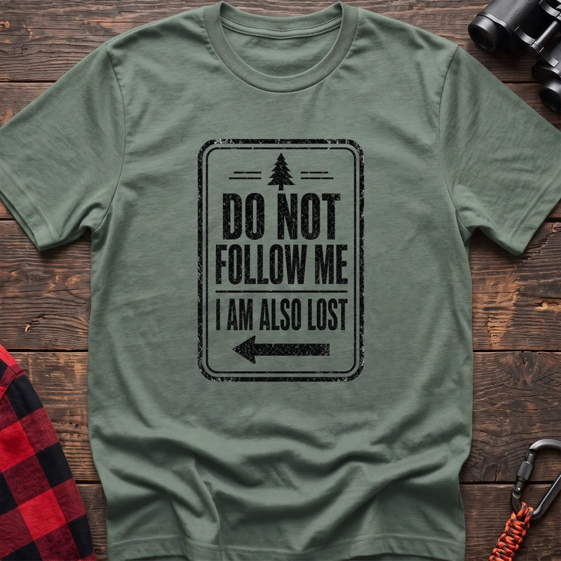 Sage hiking t-shirt with vintage trail sign reading Do Not Follow Me I Am Also Lost and a pine tree graphic