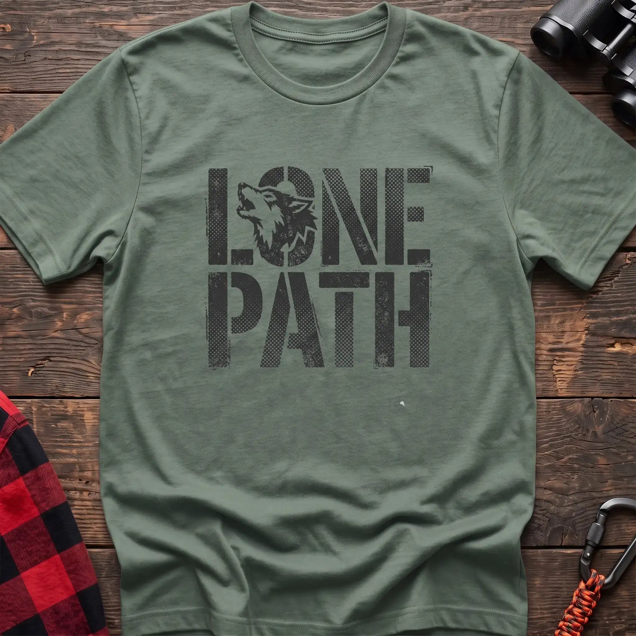 Sage t-shirt with distressed text reading Lone Path and a wolf silhouette in the letter O
