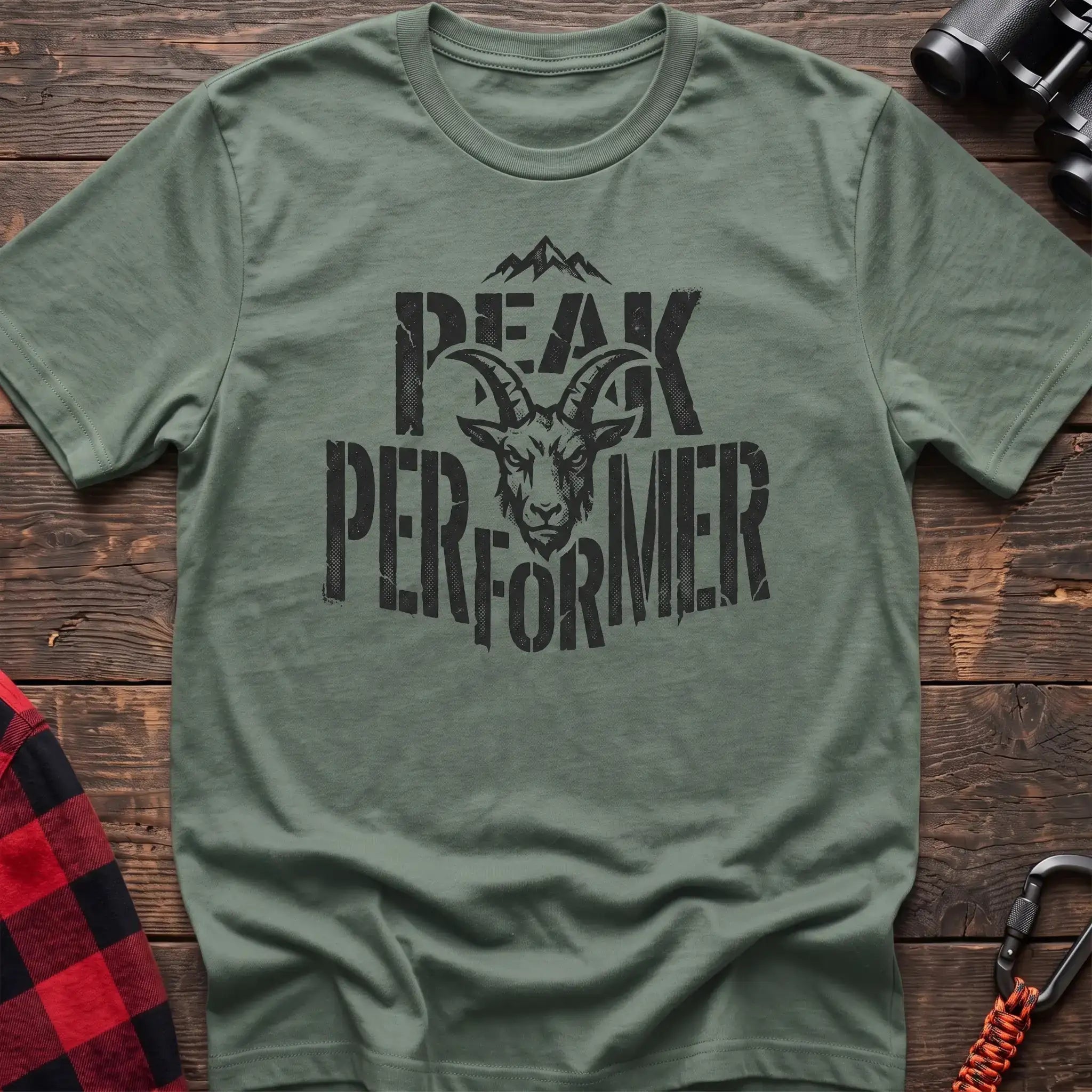 Sage t-shirt with mountain goat head graphic and the text Peak Performer