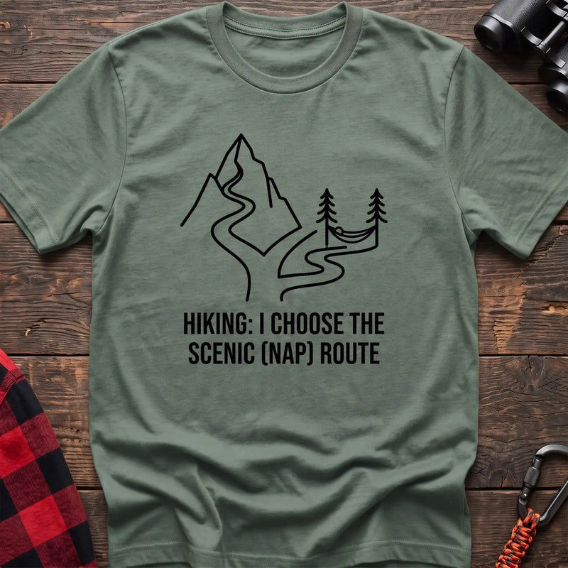 Sage t-shirt with minimalist mountain trail and hammock graphic reading Hiking I Choose the Scenic Nap Route