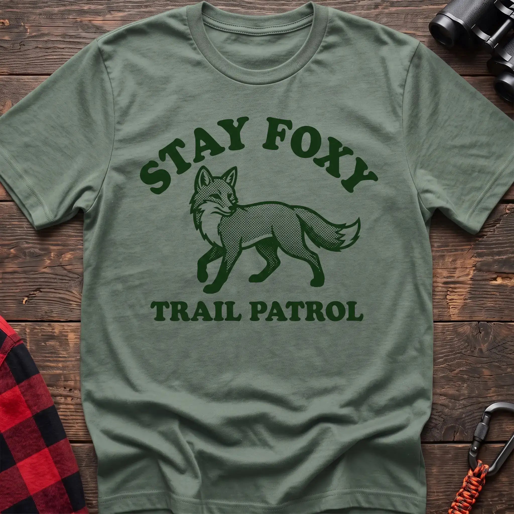 Sage green t-shirt with dark green fox illustration and the text Stay Foxy Trail Patrol
