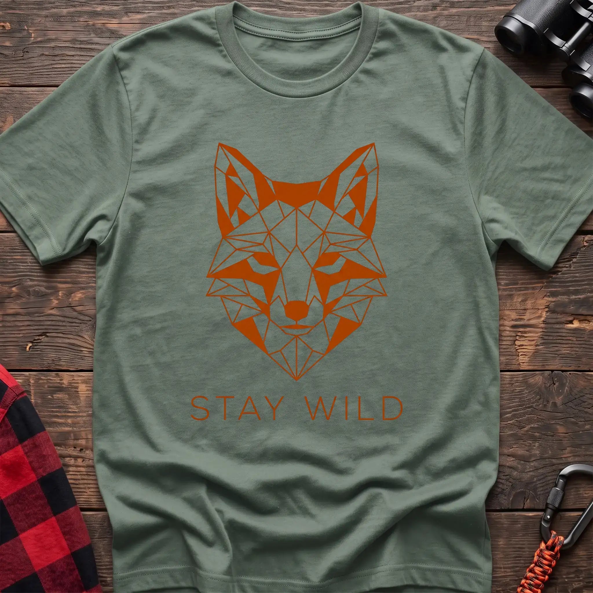 Sage t-shirt with geometric orange fox head graphic and the text Stay Wild