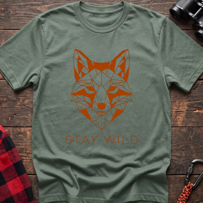 Sage t-shirt with geometric orange fox head graphic and the text Stay Wild