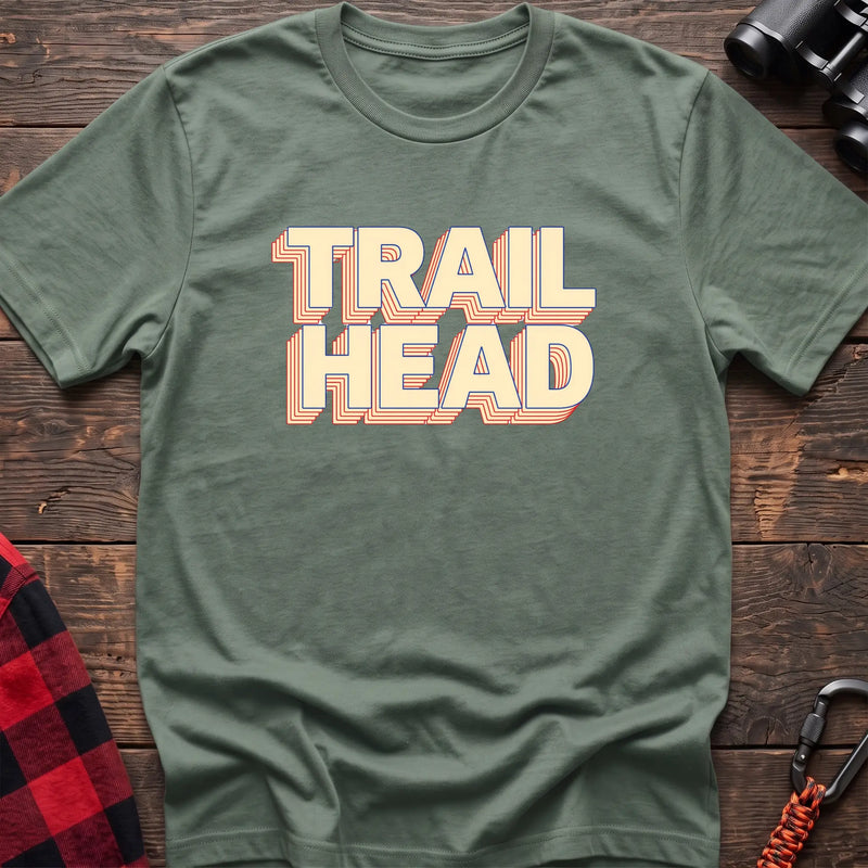 Black cotton t-shirt with retro stacked Trail Head text on rustic wood