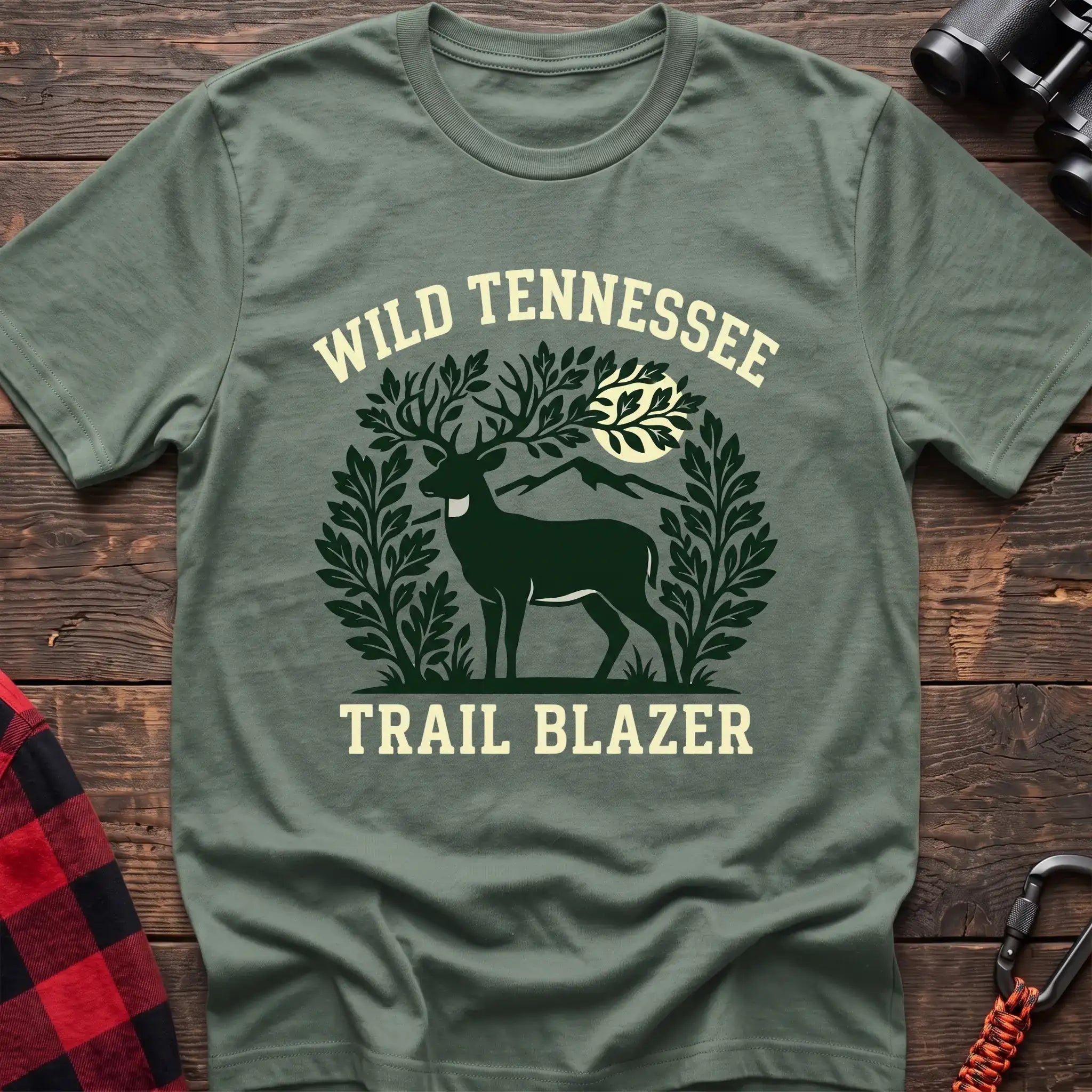 Sage t-shirt with deer among leaves and mountains graphic reading Wild Tennessee Trail Blazer