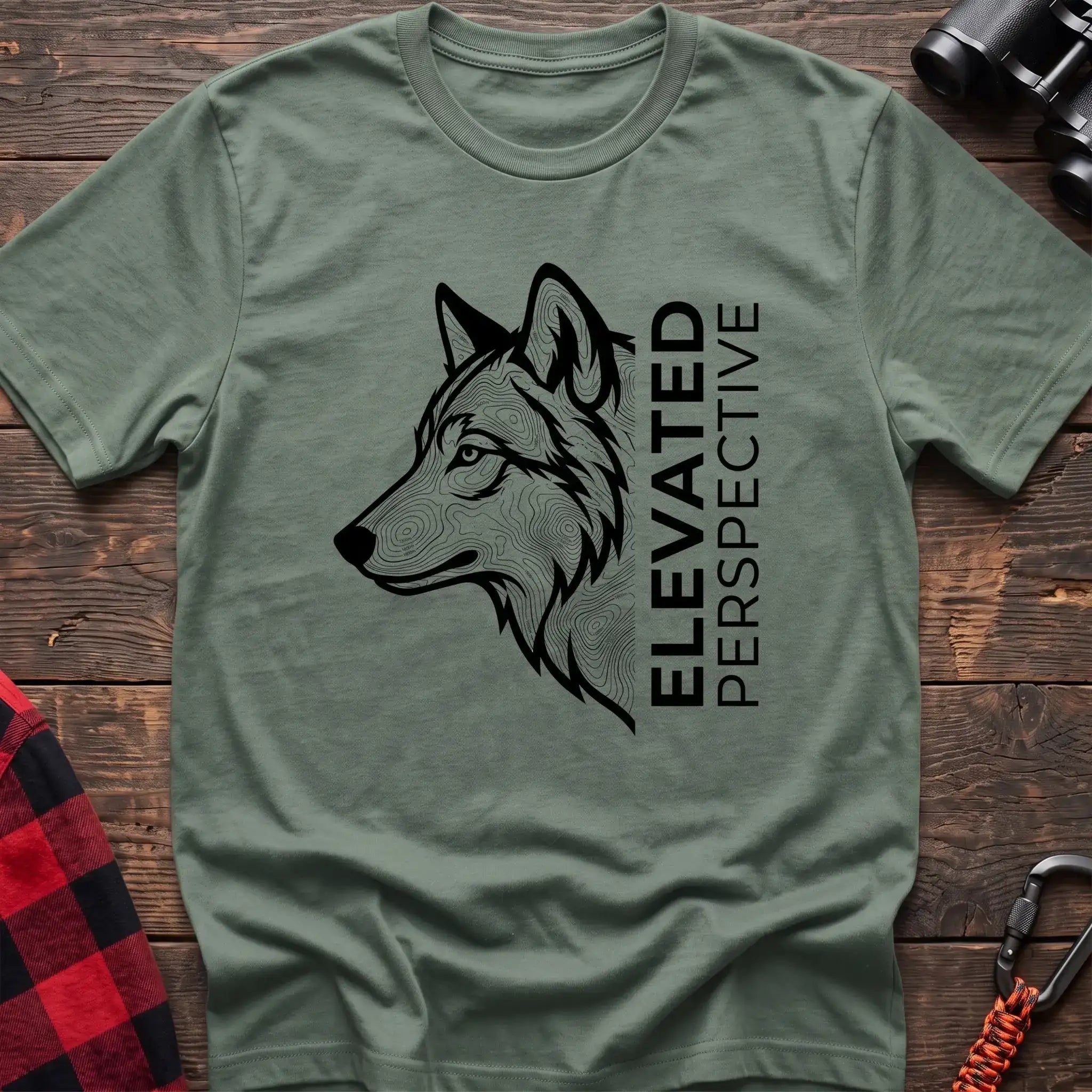 Sage t-shirt with topographic wolf head graphic and vertical text Elevated Perspective